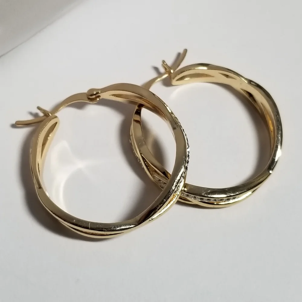 Hoop earrings braided look with sparkly clear crystals gold tone